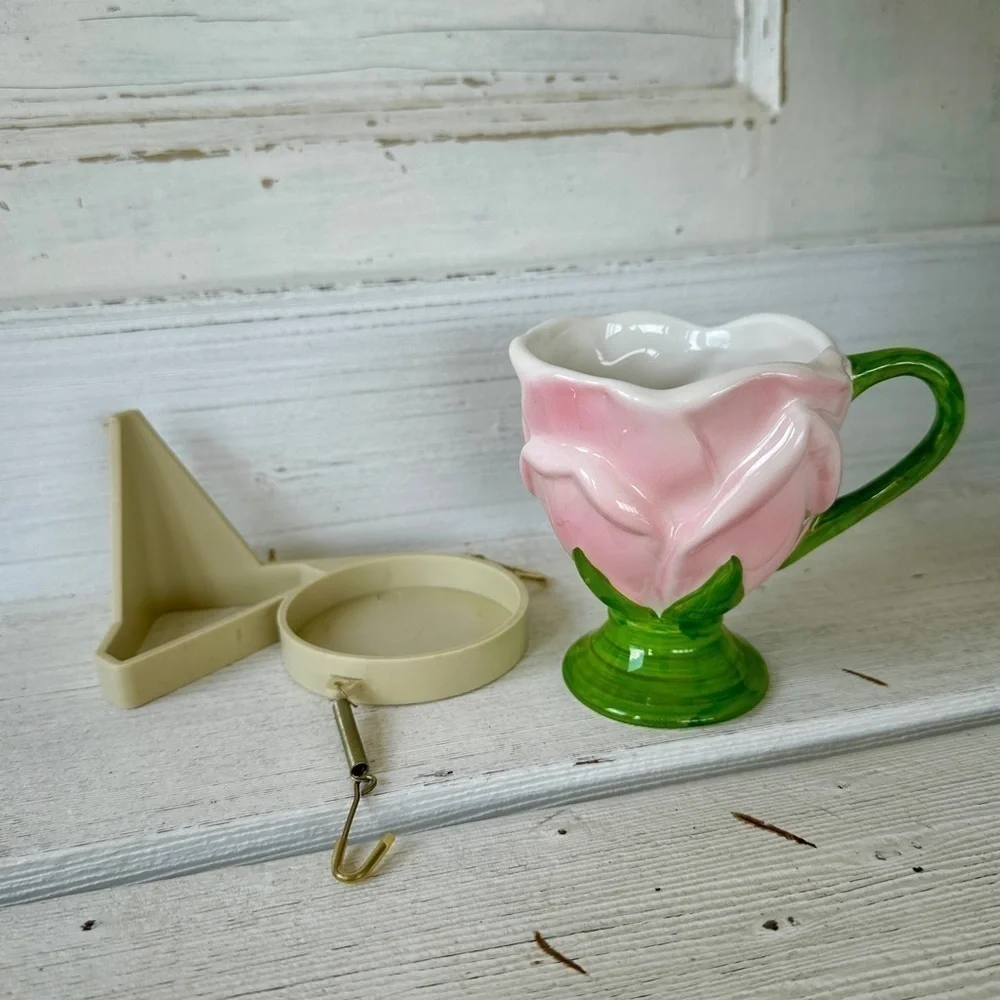 TELEFLORA, PINK TULIP CUP WITH HOLDER. CUP IS IN EXCELLENT CONDITION.